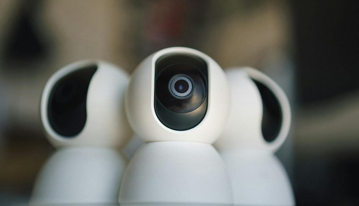 Close-up of sleek security cameras ensuring safety and privacy in indoor settings.