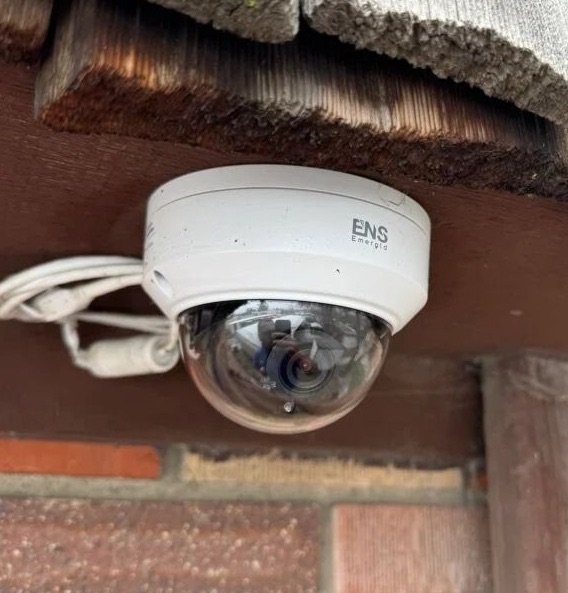 ENS Emerald dome camera installed under wooden eave