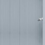 outdoor bullet CCTV camera mounted on building exterior